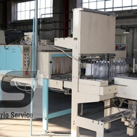 Automatic packaging machine with heating tunnel